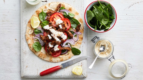  mouthwatering souvlaki featuring lamb, colorful vegetables, and salad