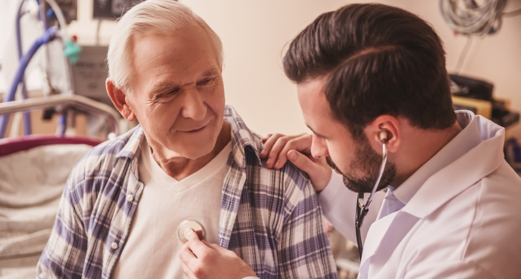 A doctor carefully examines the arm of an elderly man, ensuring his well-being and providing medical care.