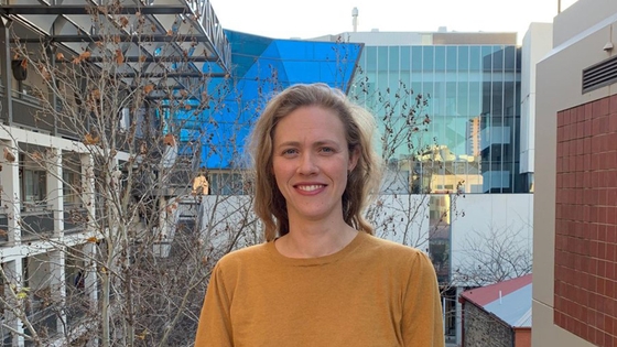 Dr Katharine McBrid facing the camera with a smiling face
