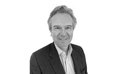 A monochrome image of Associate Professor Nicholas Cox.